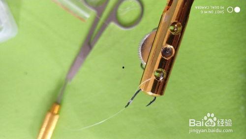绑鱼钩器视频,跟随视频学习高效绑钩方法